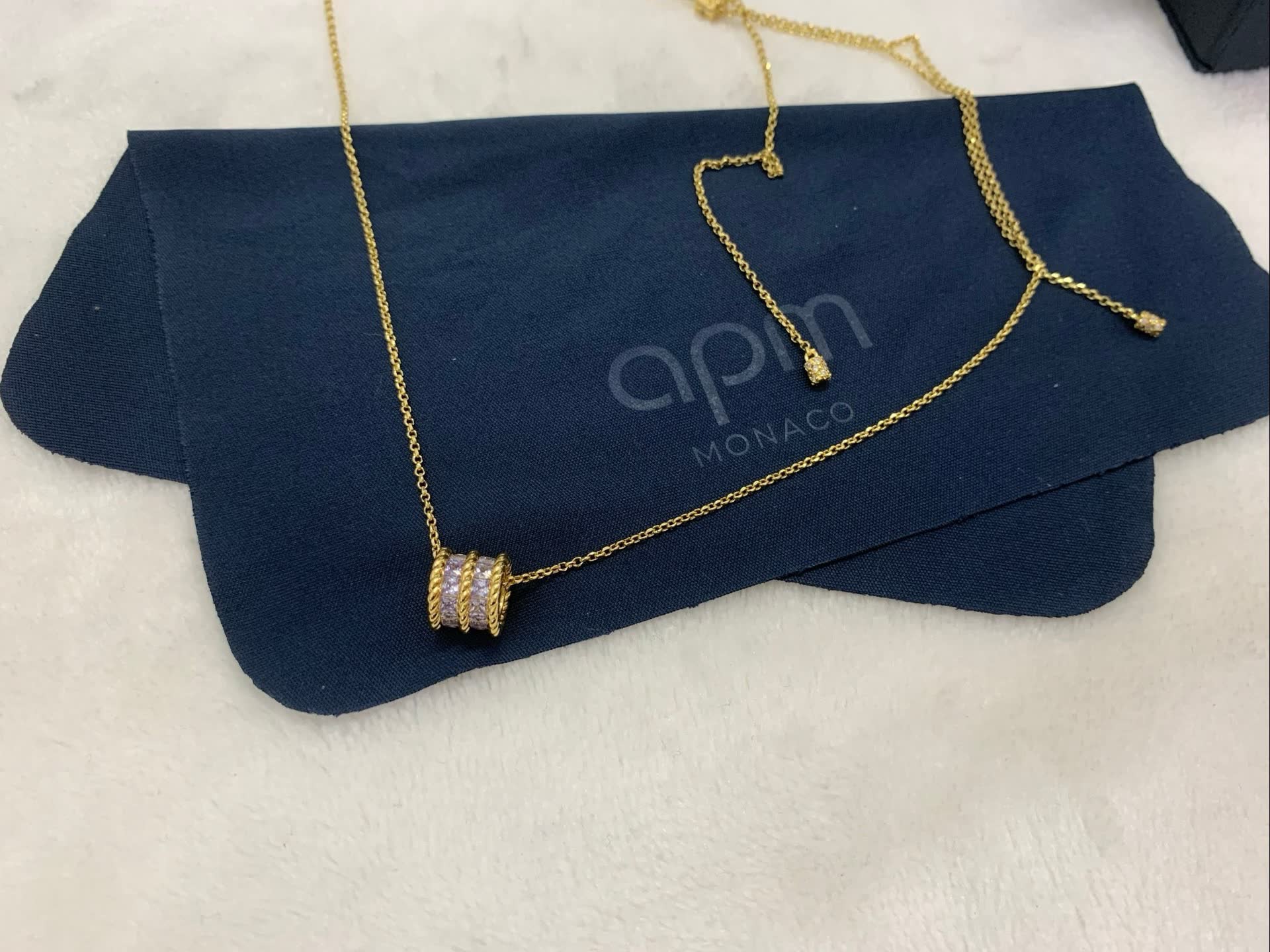 APM Monaco Gold Heart-Shaped Necklace with Purple Stones
